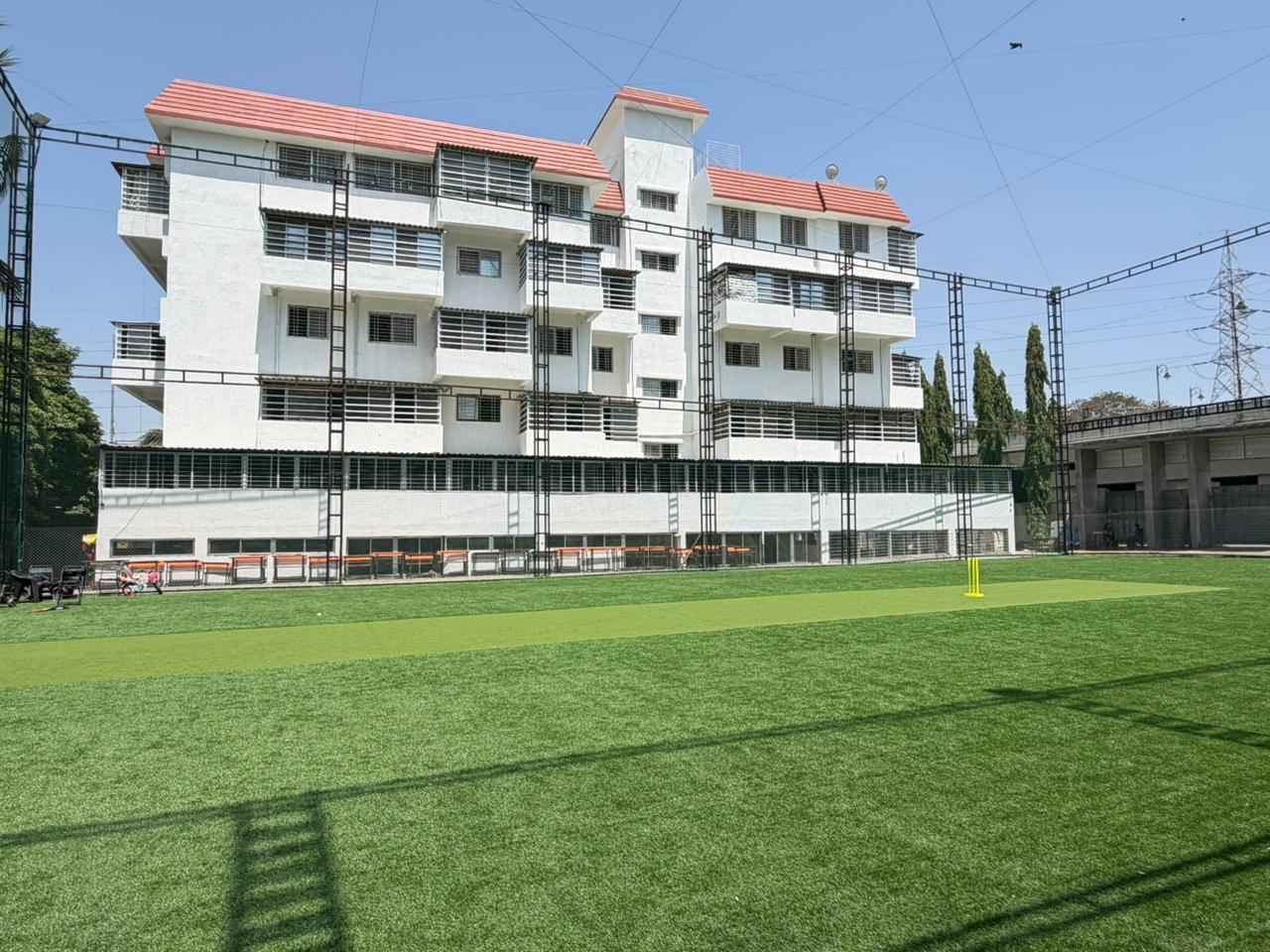 School campus building and sports ground